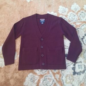 Burgundy knit cardigan.